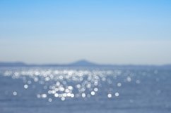 Abstract, blurred seascape with bokeh sequins Product Image 1