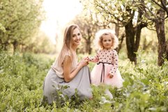 Mother with daughter outdoors Product Image 1