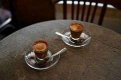 Two cups of espresso on grey concrete table Product Image 1