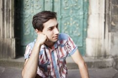 Young man walks in the city Product Image 1