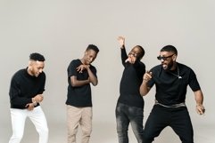 Multiethnic men dancing in a white studio Product Image 1