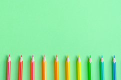 School and office supplies on office table, green background Product Image 1