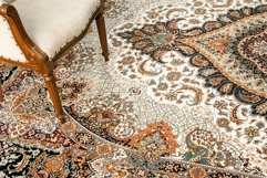 Antique chair on a the decorated oriental carpet Product Image 1