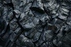 A closeup shot of a rough, cracked charcoal surface Product Image 1