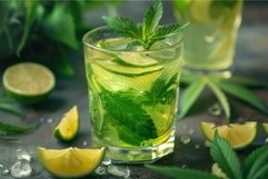 Glass of refreshing green drink with cannabis leaves, lime a Product Image 1