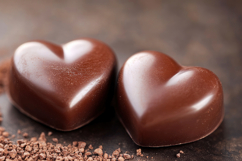 Heart Shaped Chocolate Background Wallpaper Product Image 1