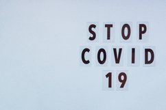 Text stop covid -19 on blue background with copy space. Product Image 1