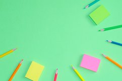 School and office supplies on office table, green background Product Image 1