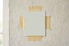 A blank white Polaroid sheet of paper taped Product Image 1