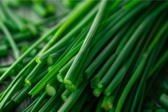 Fresh chives lying on a table Product Image 1