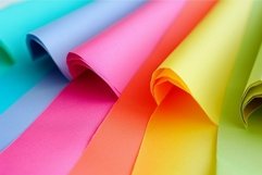 Vibrant colored paper rolls on smooth background Product Image 1