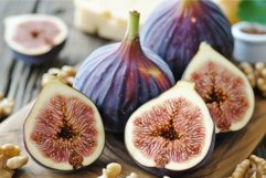 Fresh figs on wooden table Product Image 1