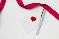 Red ribbon on a white background envelope with pen Product Image 1