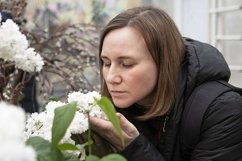 young woman in a blooming garden in spring Product Image 1