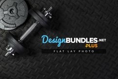 flatlay image of weights on gym mat