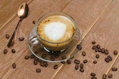 Cup of hot coffe with milk on a dark background. Product Image 1