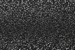A black glittery surface with small white sparkles Product Image 1