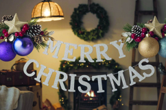 A glittery &quot;Merry Christmas&quot; banner with festive decorations Product Image 1