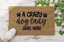 A crazy dog lady lives here SVG, Dog Doormat SVG Product Image 1