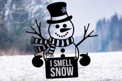 A cheerful snowman holding a sign saying "I smell snow" Product Image 1
