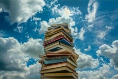 Tower of books reaching for the cloudy sky symbolizing knowl Product Image 1