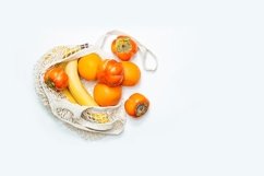 Fruit in a mesh shopping bag. Product Image 1