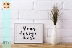 White landscape frame mockup with dark grass in elegant vase Product Image 1