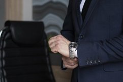 portrait of a businessman in a dark blue suit in the office Product Image 1