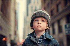 Curious toddler in urban setting Product Image 1