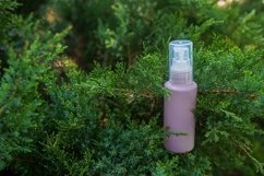 Purple cosmetic bottle with serum, essential oil Product Image 1