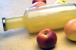 Glass bottle with a juice Product Image 1