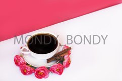 Cup of coffee with cinnamon on a pink background Product Image 1