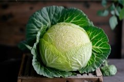 Fresh green cabbage on wooden surface Product Image 1