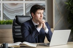 portrait of a businessman in a dark blue suit in the office Product Image 1