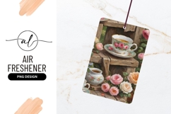 Teacup Saucer and Roses on Wooden Table with Tea and Floral Product Image 1