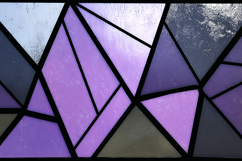 A stained glass window with geometric shapes Product Image 1
