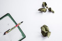 Notepad for notes. Pen on a white background. Product Image 1