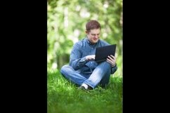 Businessman working in the city park. Product Image 1