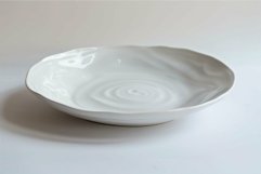 Large white ceramic plate standing on white background Product Image 1