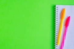 School and office supplies on office table, green background Product Image 1