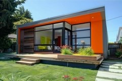 Modern home exterior with vibrant orange accents Product Image 1