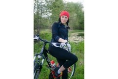 Young woman with bike Product Image 1