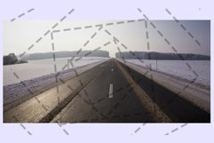 wide paved winter road Product Image 1
