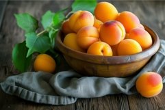 Fresh apricots in wooden bowl on rustic table Product Image 1
