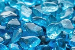 Shimmering blue glass pebbles close-up Product Image 1