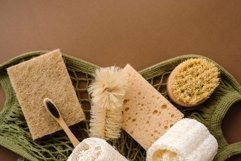 Cotton bag with a toothbrush and detergents, top view Product Image 1