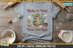 Cute crocodile wearing an apron holding spoons in a messy kitchen with spilled batter, broken eggs, and the quote &quot;Bake at Your Own Risk.&quot;