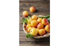 Sweet apricots on the wooden table Product Image 1