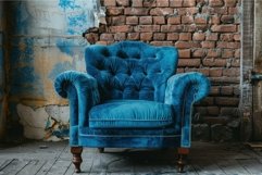 Luxurious blue velvet chesterfield armchair sitting in empty Product Image 1