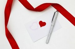 Red ribbon on a white background envelope with pen Product Image 1